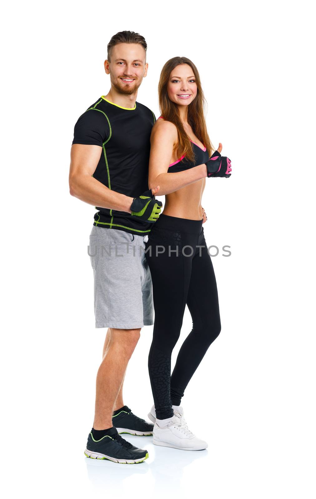 Athletic man and woman after fitness exercise with a finger up on the white background