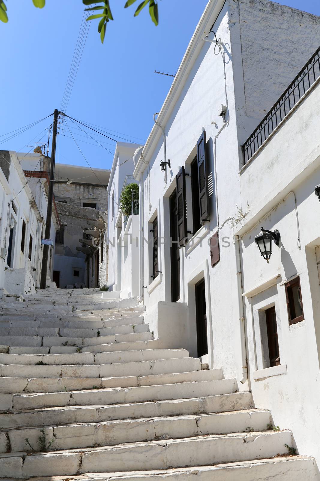The small streets of Apiranthos at the Naxos island at the Cyclades of the Aegean sea in Greece