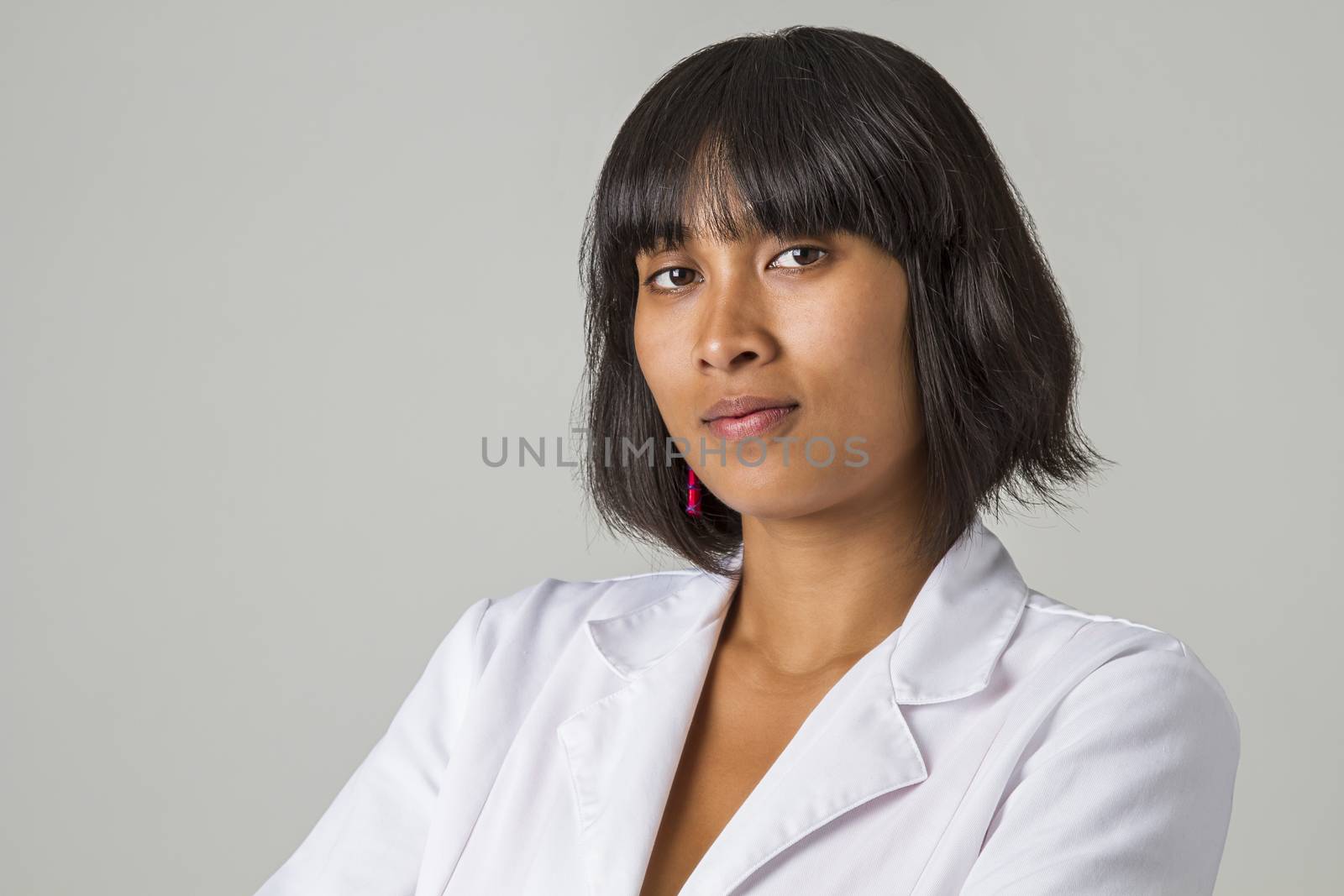 Young asian woman wearing a lab coat