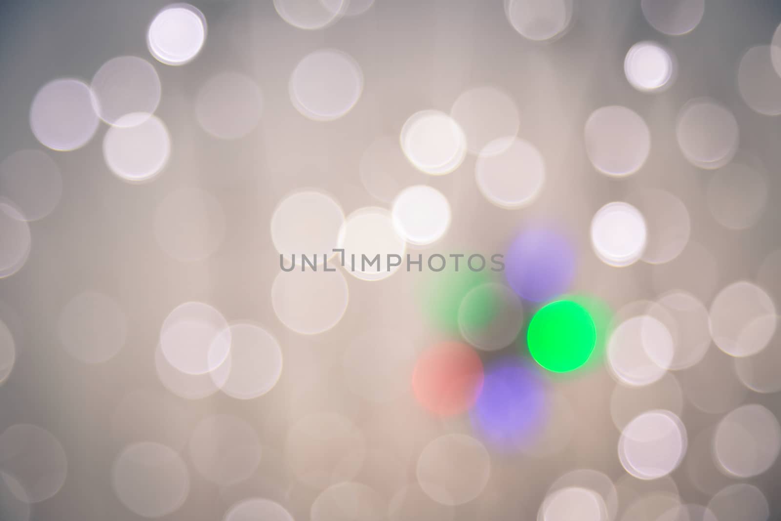 Defocused bokeh lights, abstract background with vignette