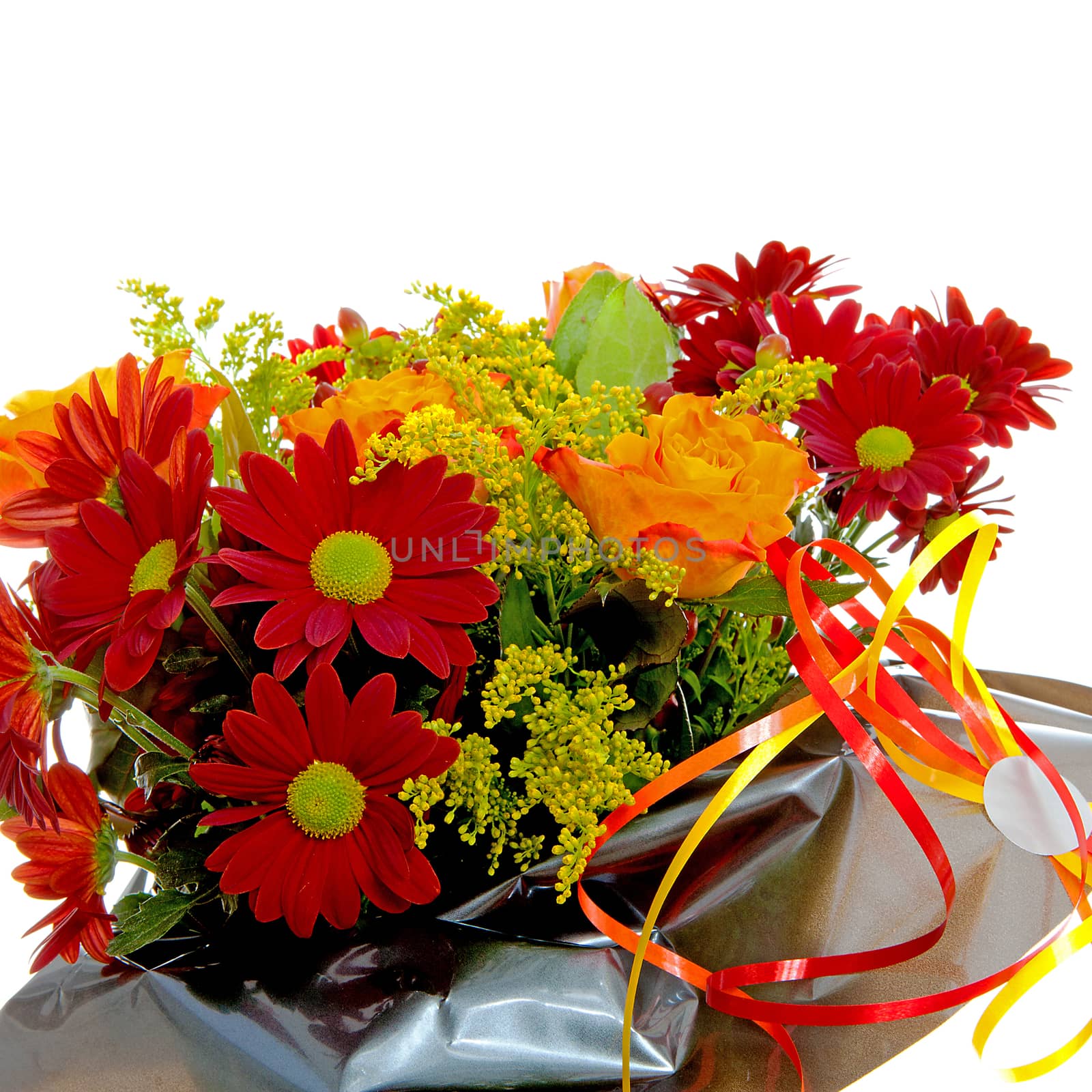 bouquet of flowers in gift paper over white background