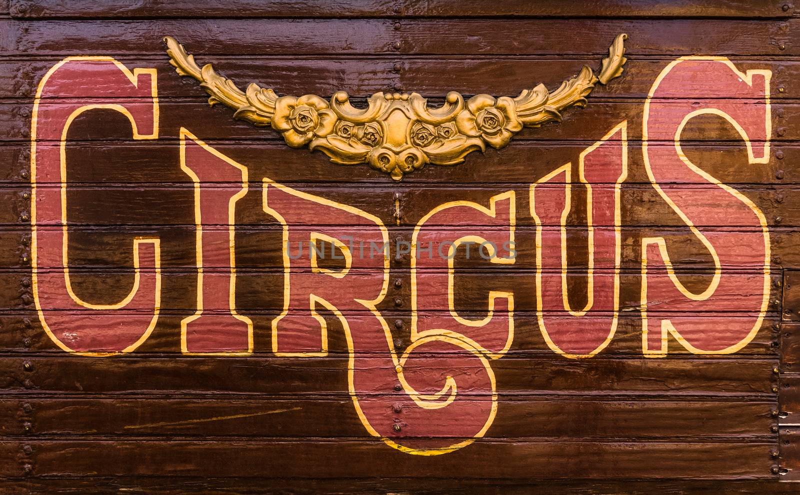 Retro Style Rustic Circus Sign On The Side Of A Caravan Or Wagon