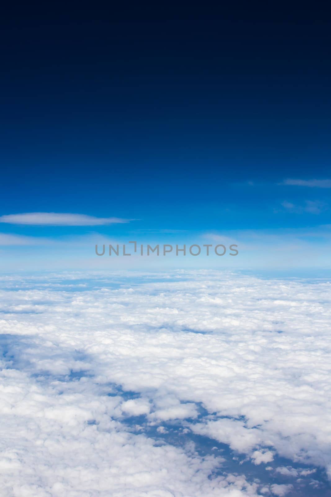 blue sky above overcast cloud air view background only