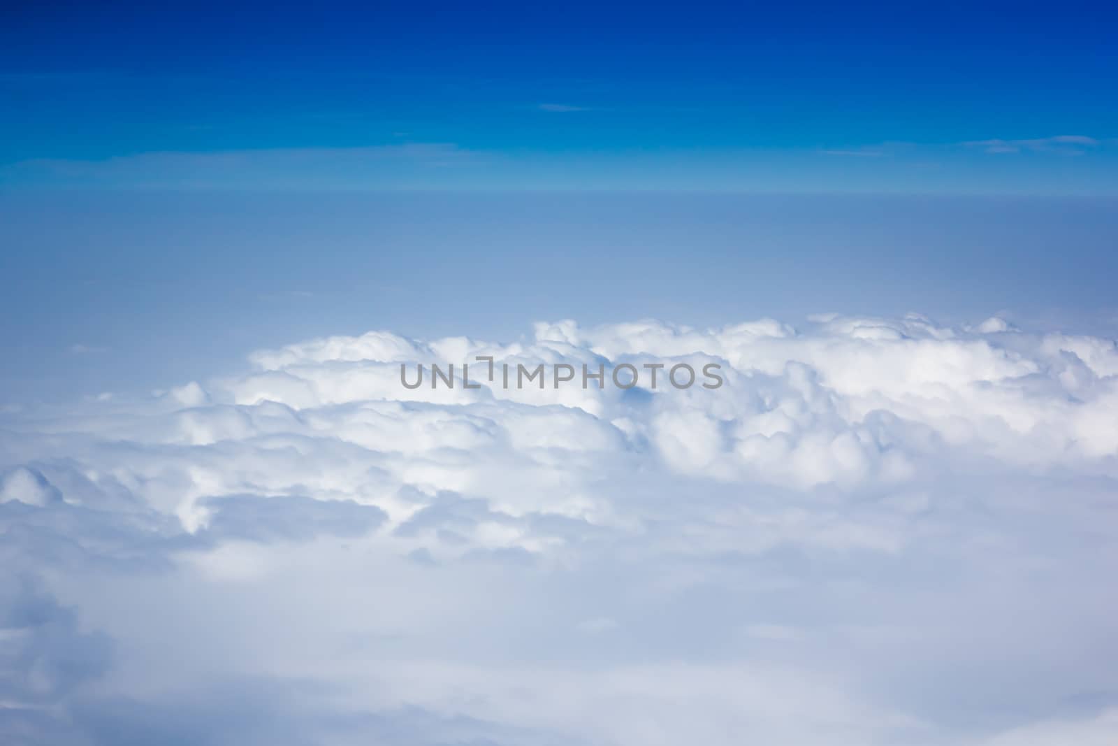 blue sky above overcast cloud air view background only