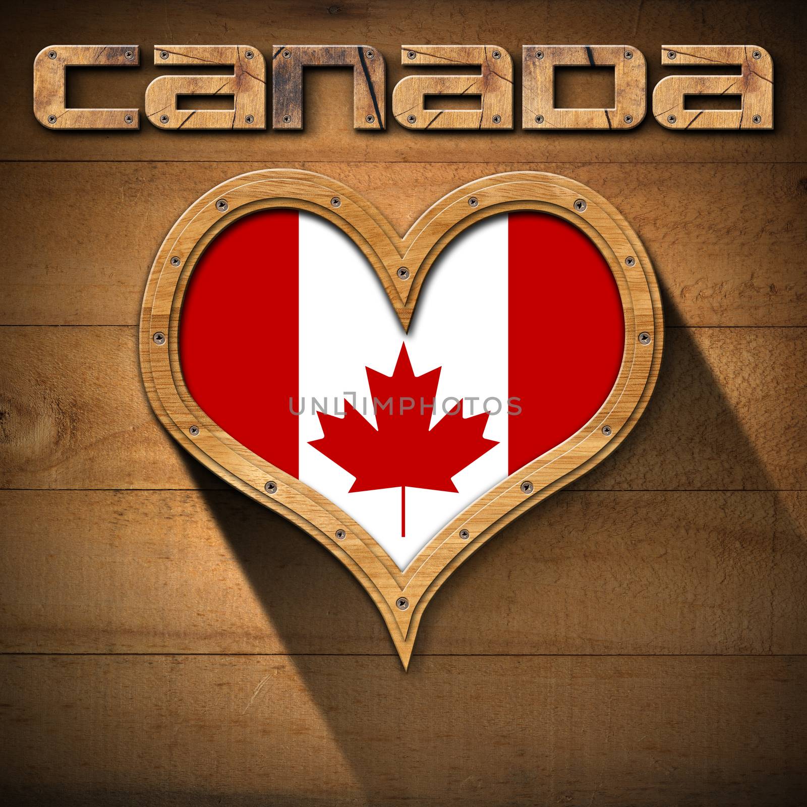 Wooden frame in the shape of heart with Canadian flag interior. On wooden wall with wooden text Canada