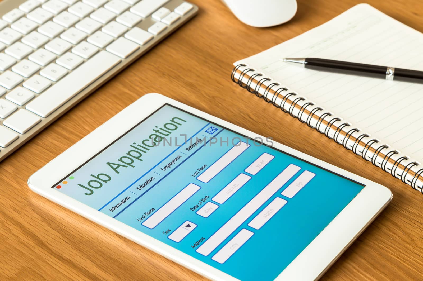 Digital tablet pc showing online job application form  by vinnstock