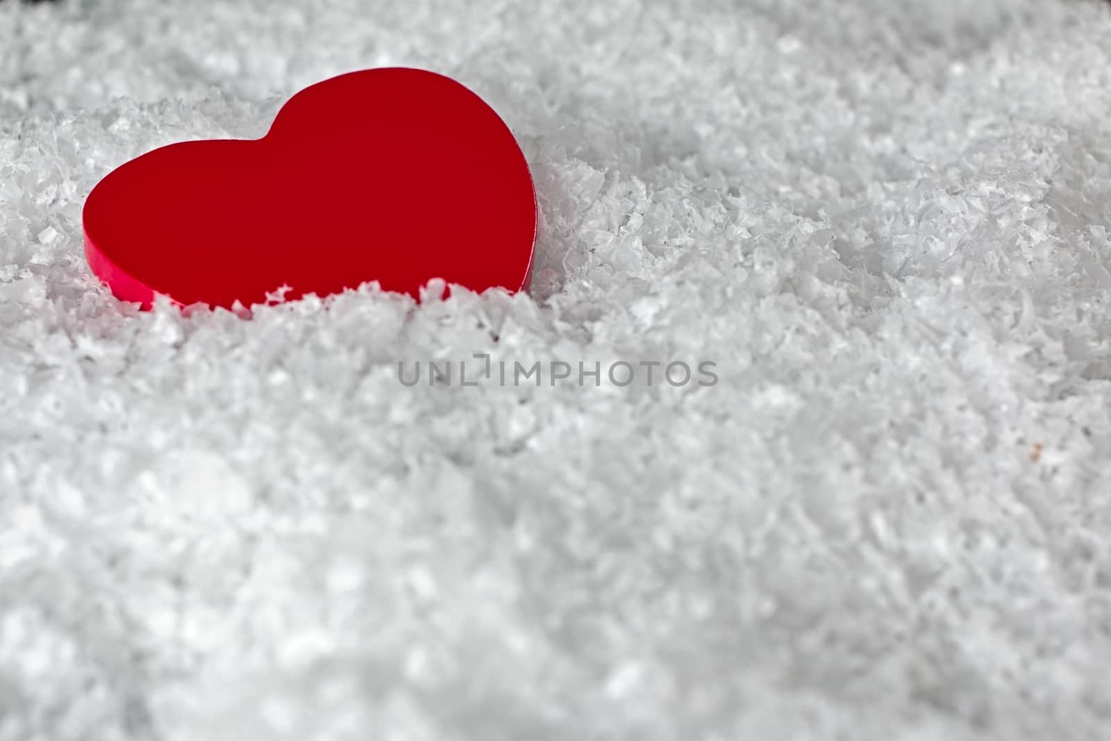 Red heart in the snow by EnzoArt