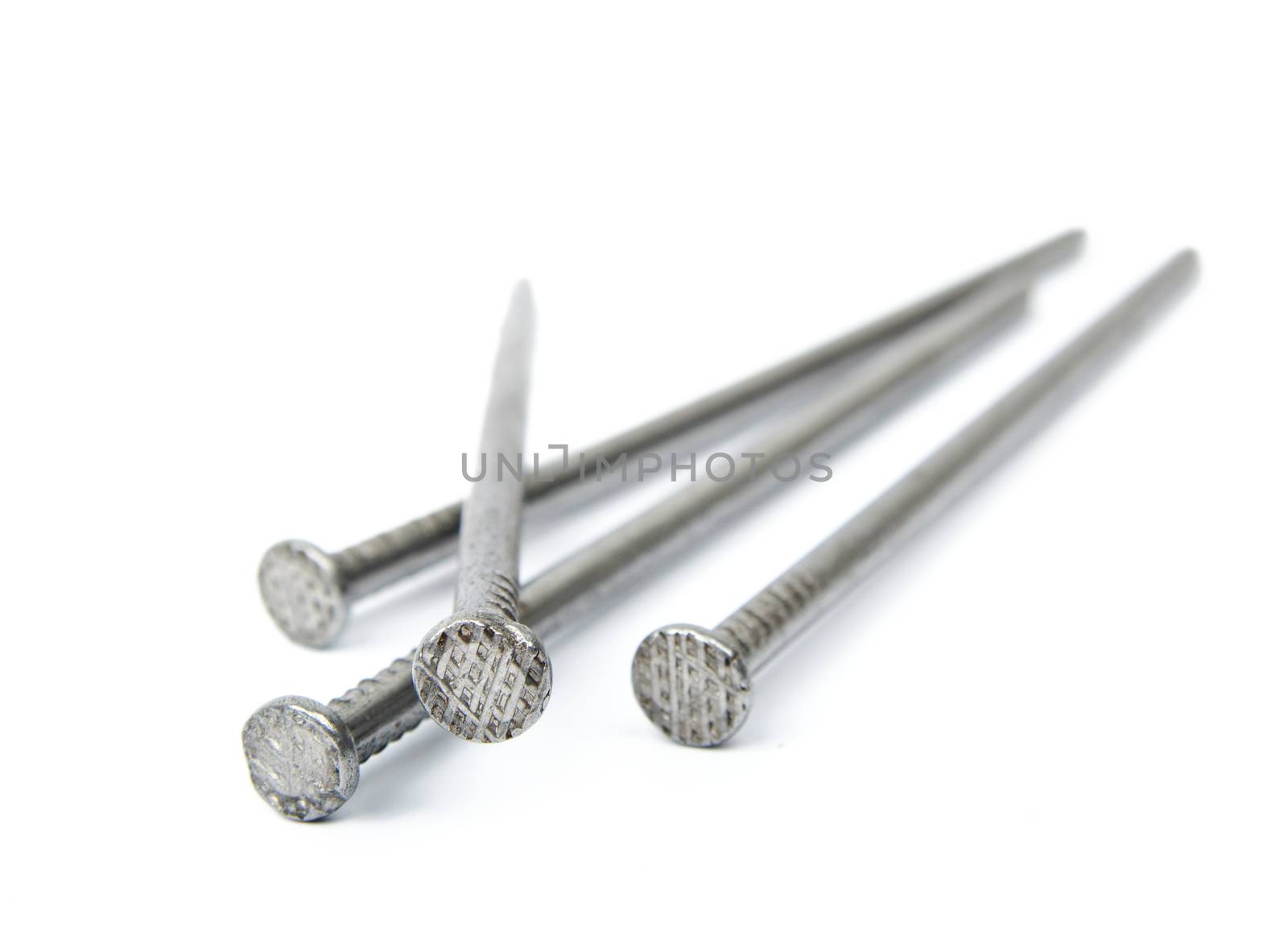 An image of Iron nails on white background