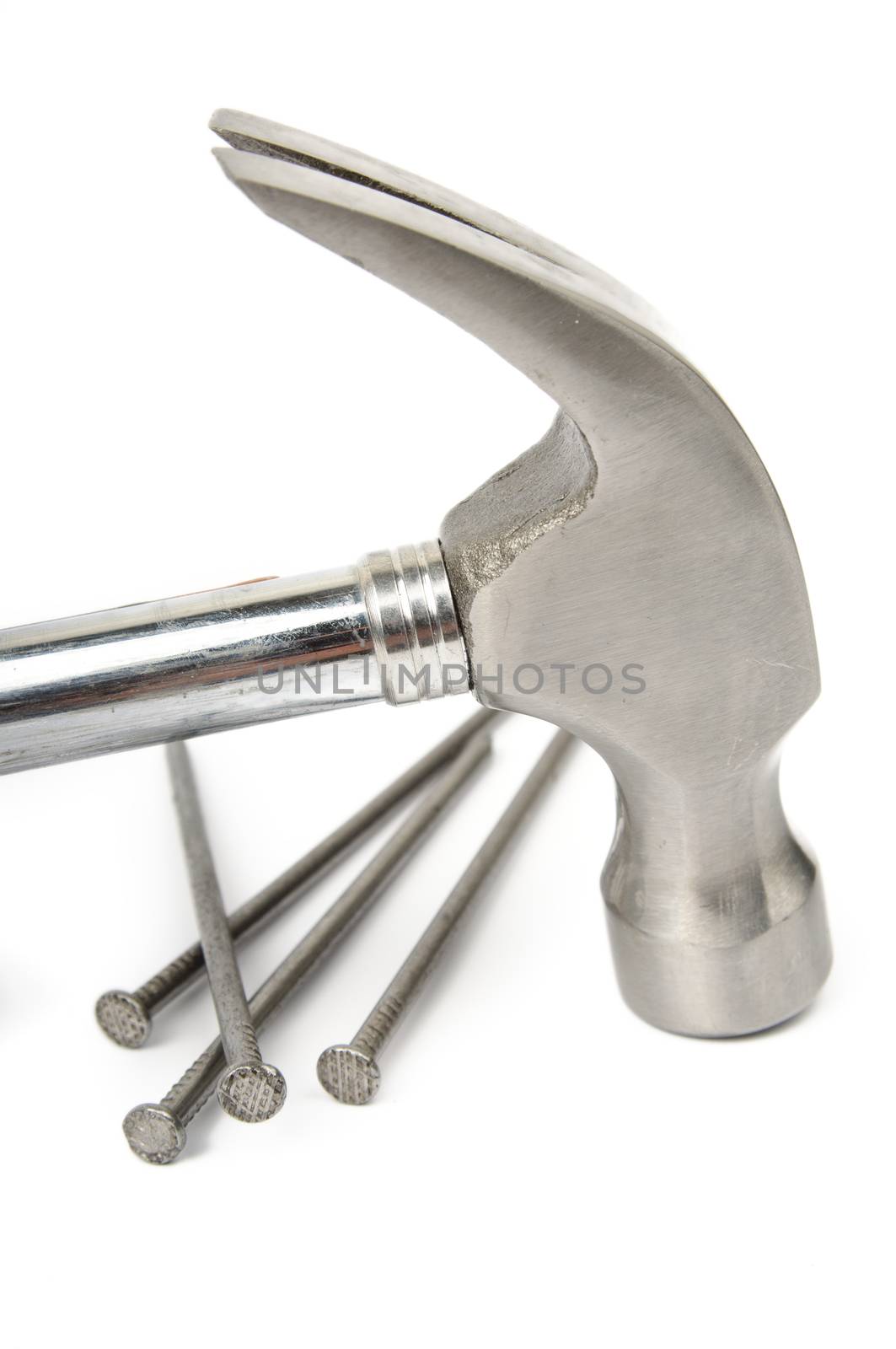 An image of hammer and nails on white