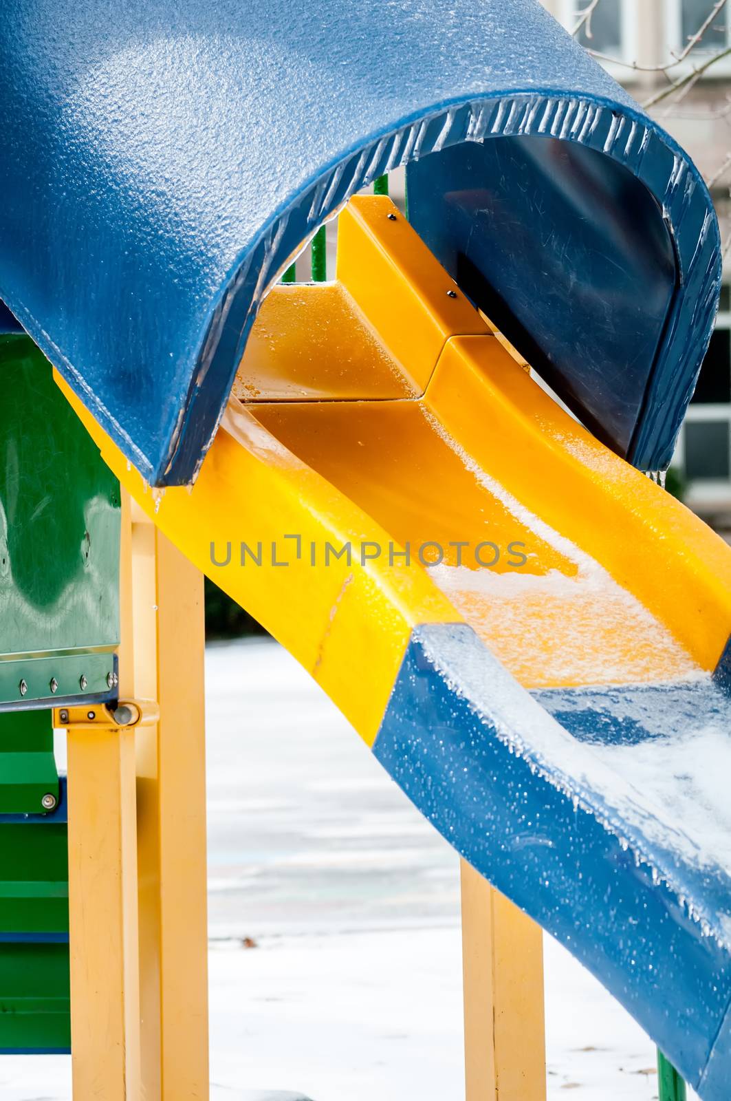 snow and ice covered playground