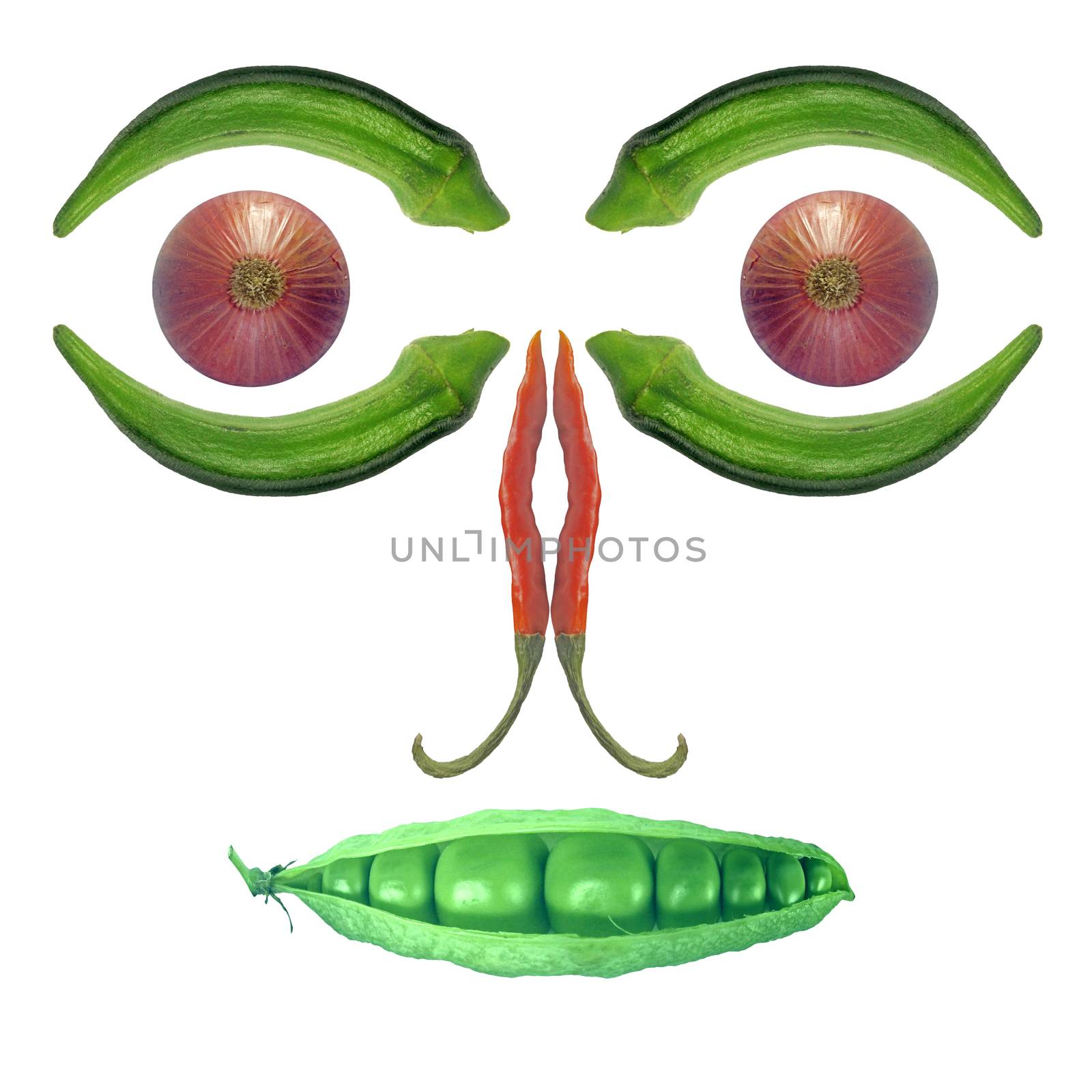 Face created with different vegetables
