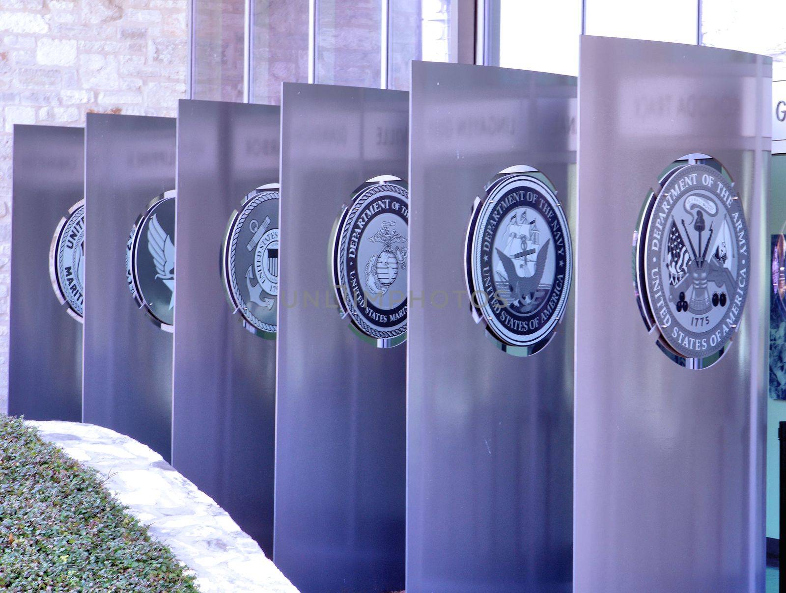 FREDERICKSBURG, TEXAS/UNITED STATES - FEBRUARY 21: Seals of the U.S. armed forces are displayed in front of the National Museum of the Pacific War in  Fredericksburg, Texas on February 21, 2015.