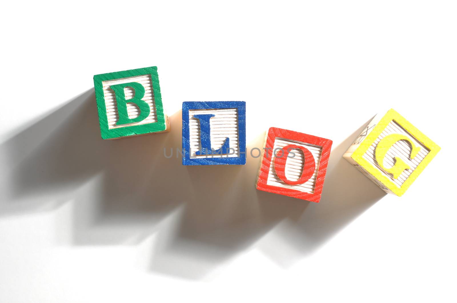 Alphabet Blocks spelling the words blog on white