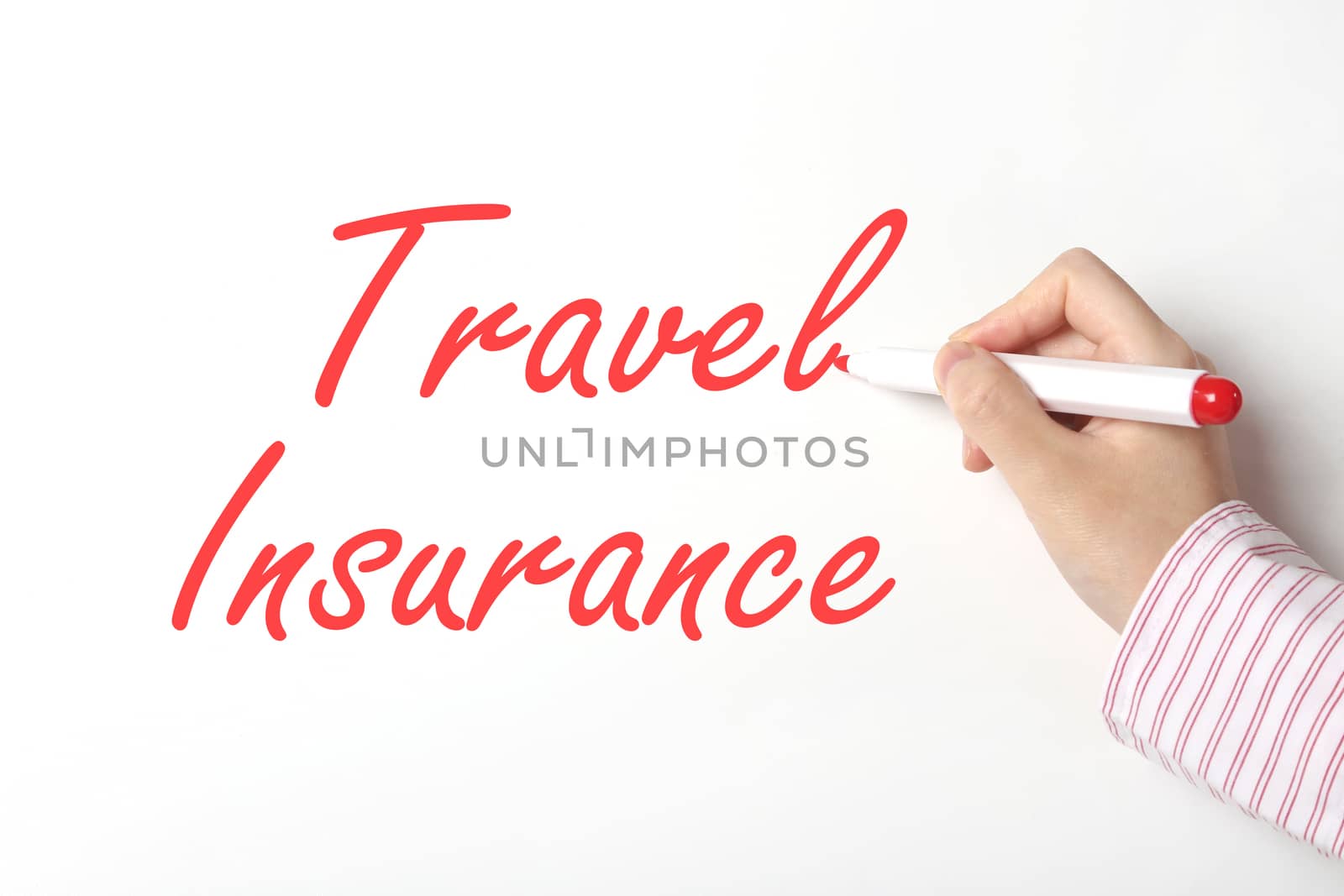 Business woman writing travel insurance word on whiteboard