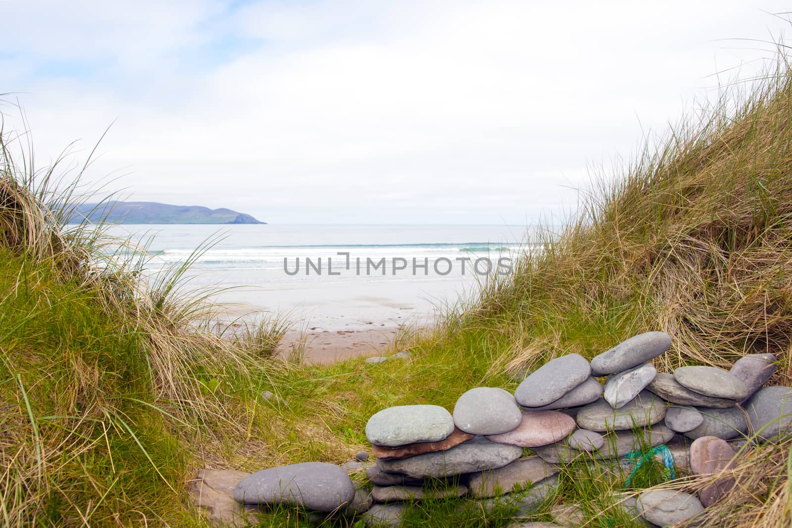 stone wall shelter on a beautiful beach in the maharees county Kerry Ireland