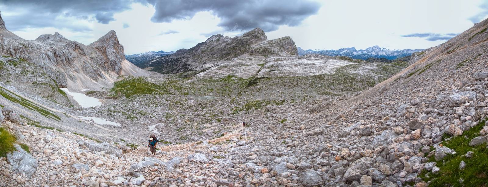 Scenic panorama of hikers ascending in Julian Alps, Slovenia