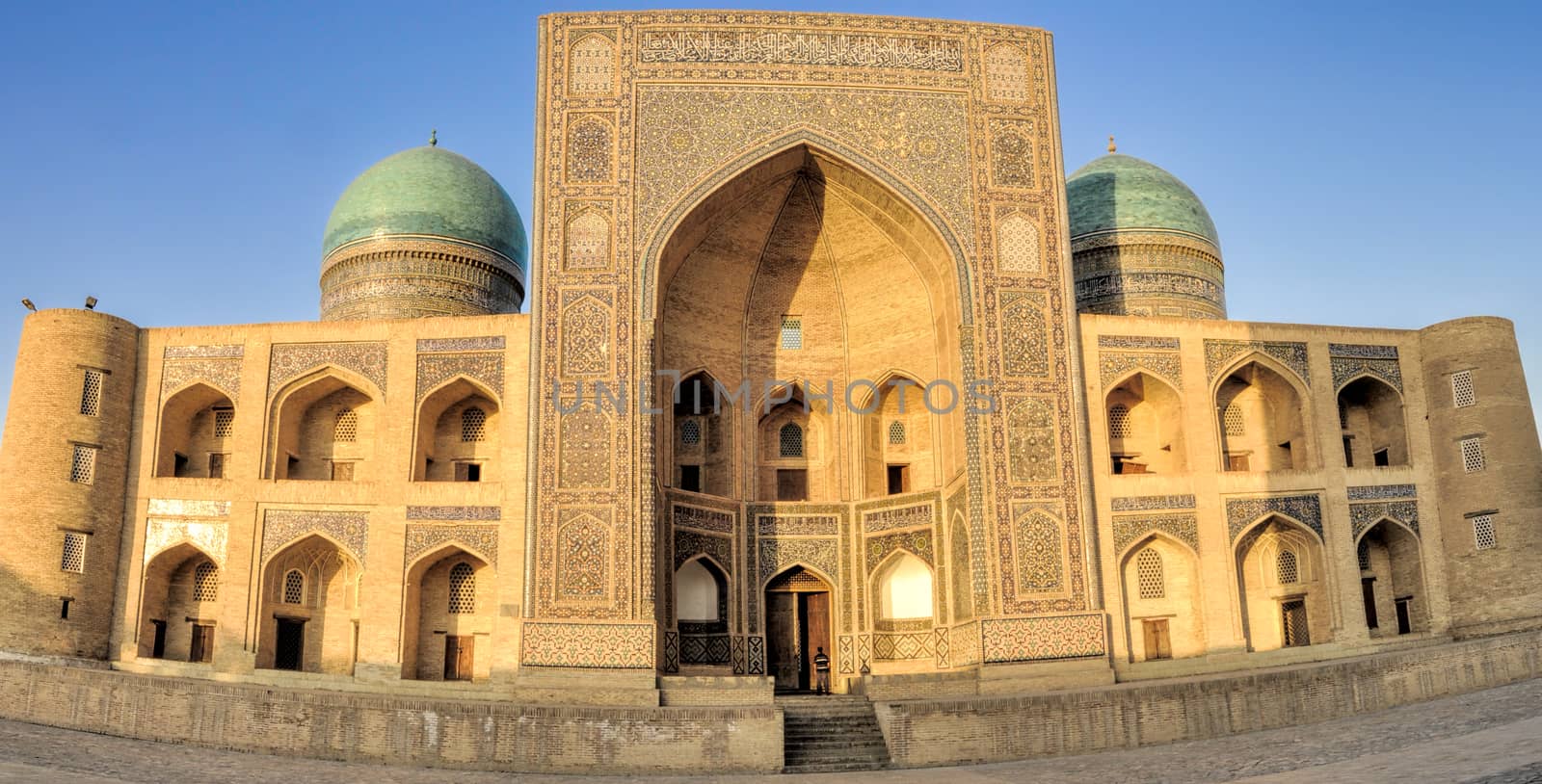 Picturesque view of the entrance to Abdulaziz Khan Madrassah (Museum of Wood Carving Art), Uzbekistan