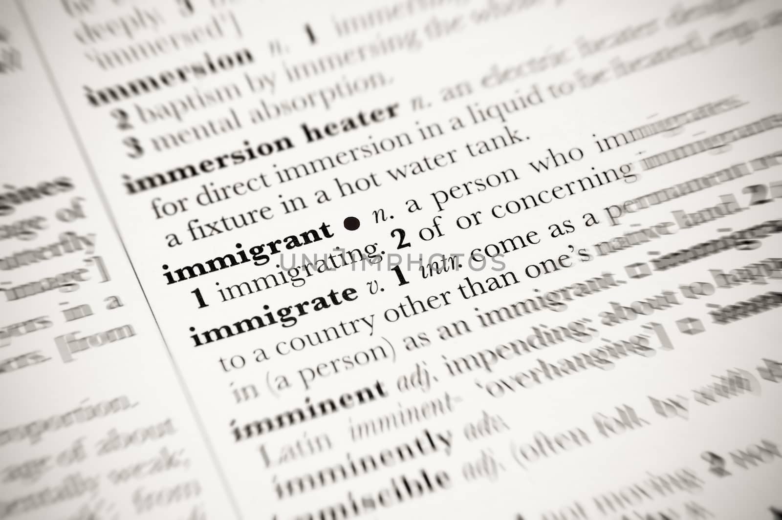 dictionary definition of immigrant with blurred edges