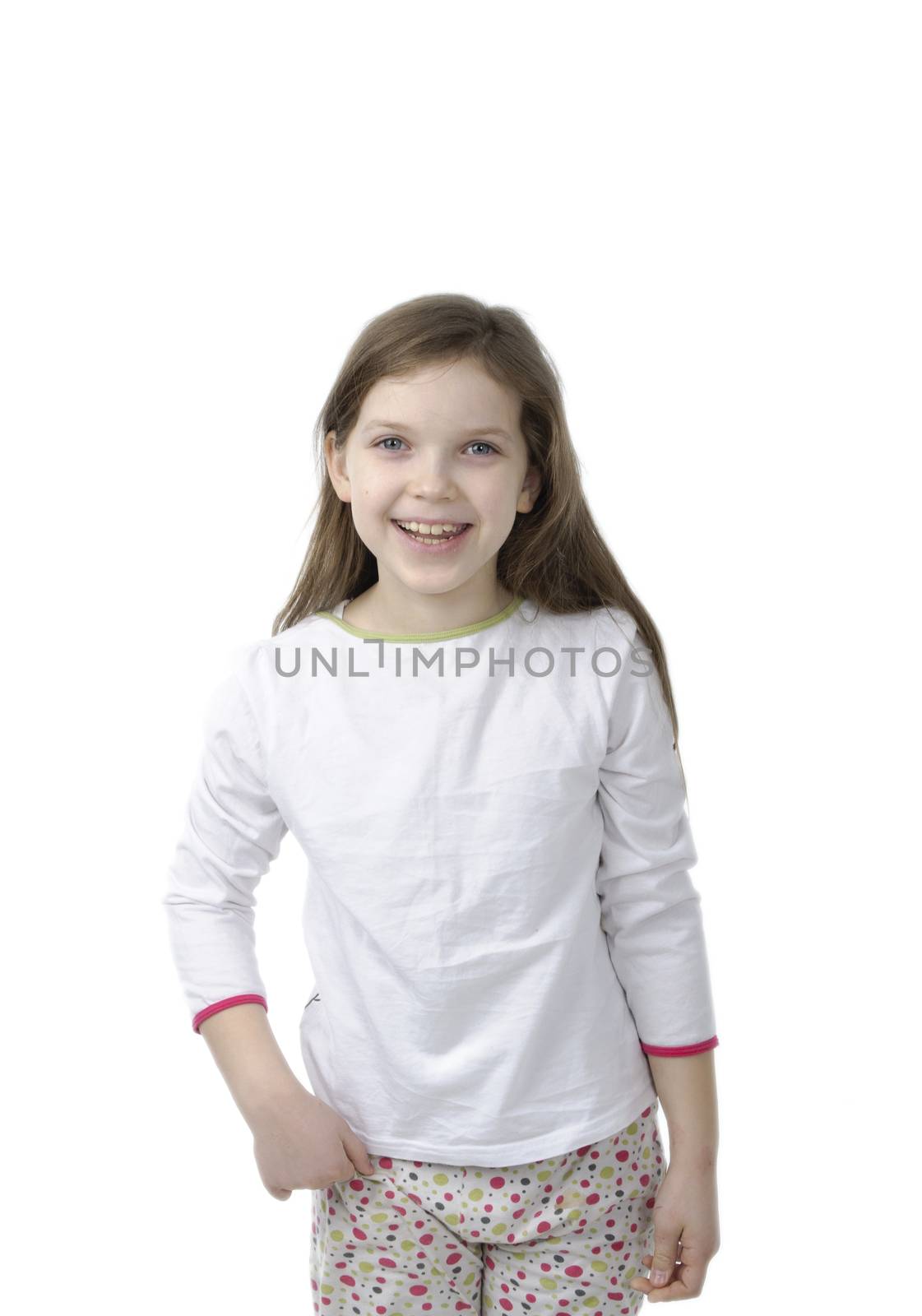 Little girl in nightwear on white by velkol