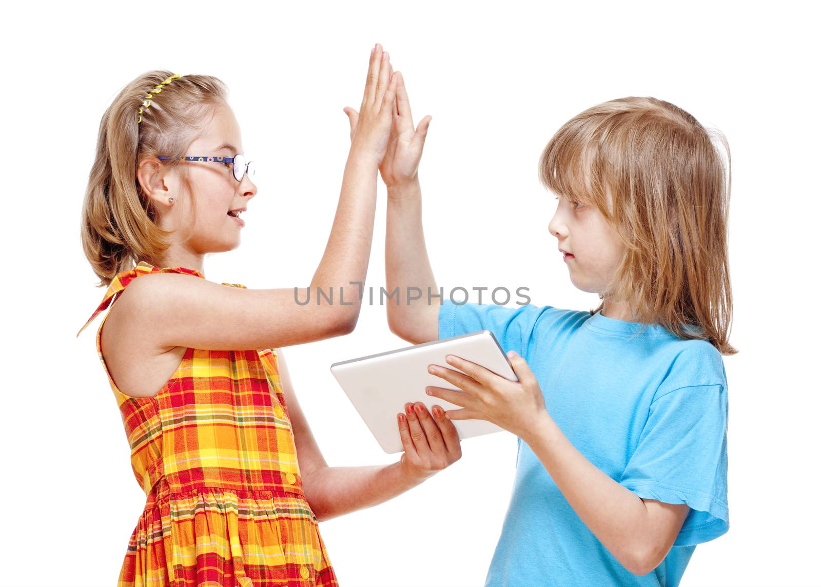 Two Children Doing High Five Gesture by courtyardpix