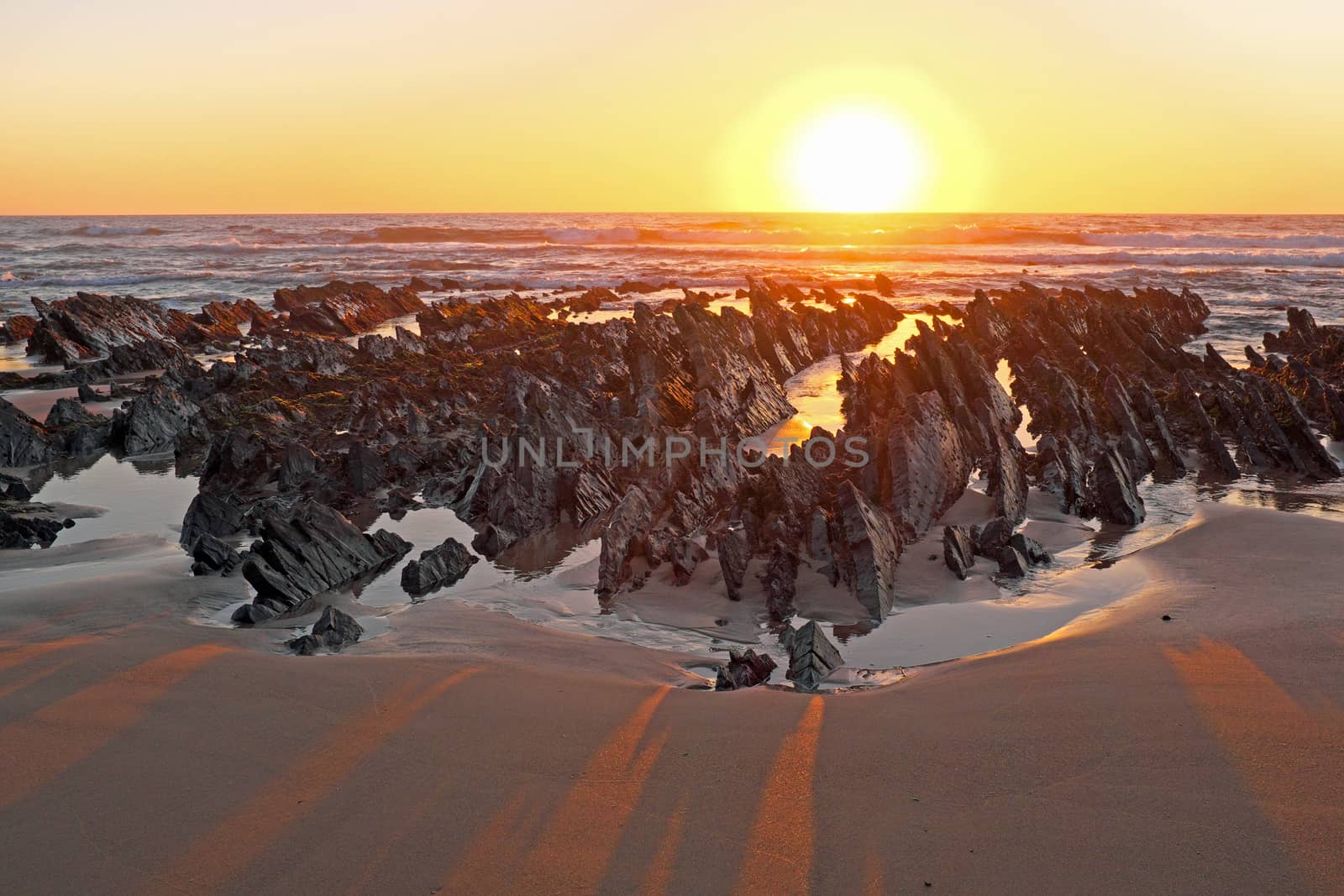 Natural rocks at the atlantic ocean in Portugal at twilight