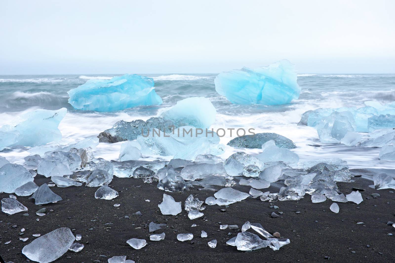 Ice rocks on a black sand beach in Iceland