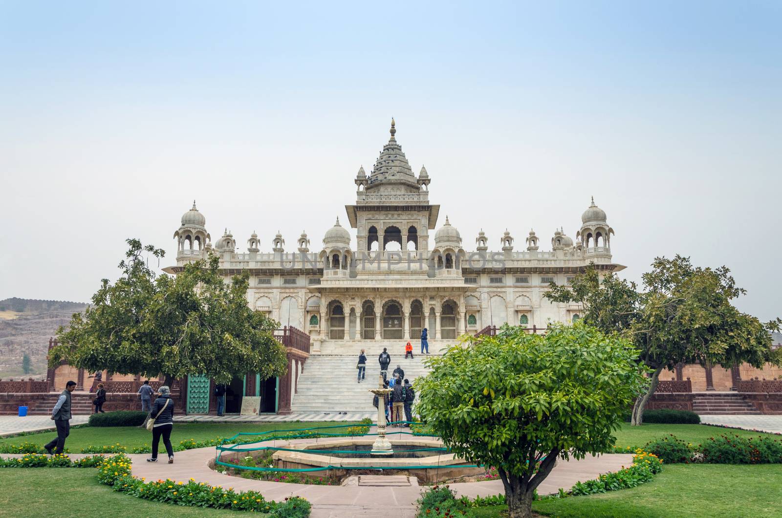 Jodhpur, India - January 1, 2015: Tourist visit The Jaswant Thada mausoleum on January 1, 2015 in Jodhpur, India. It is a white marble memorial built by Maharaja Sardar Singh of Jodhpur State in 1899 in memory of his father, Maharaja Jaswant Singh II.