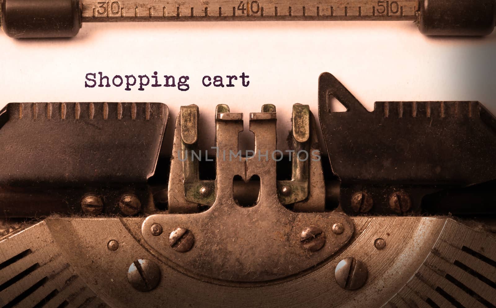 Vintage inscription made by old typewriter, shopping cart