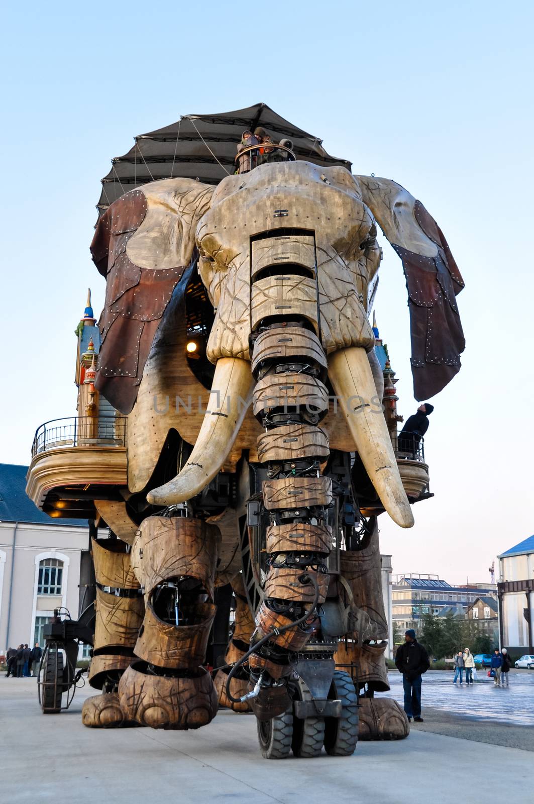 NANTES, FRANCE - CIRCA DECEMBER 2009: The Great Elephant goes for a walk with passengers aboard.