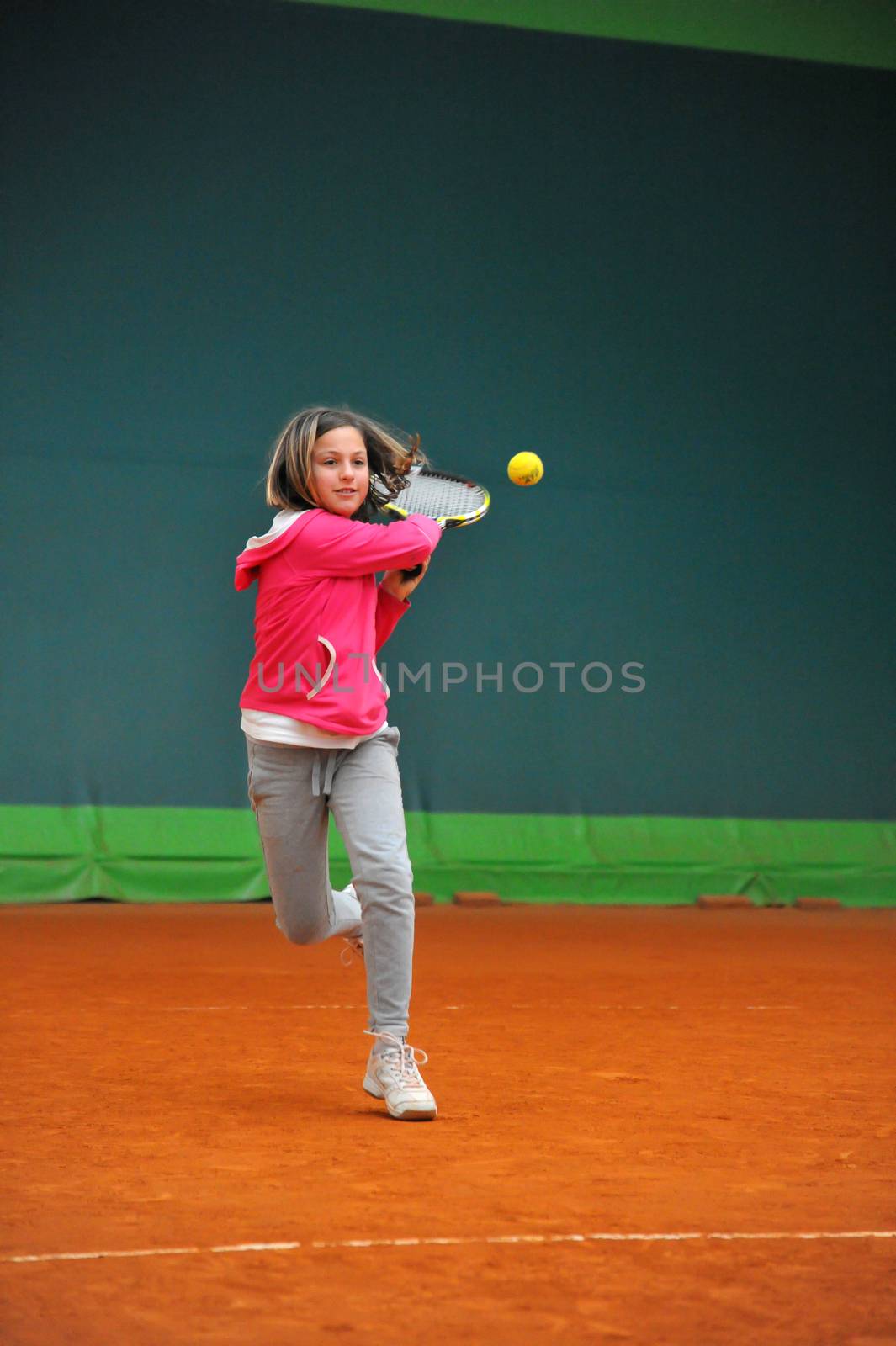 Children at school during a dribble of tennis