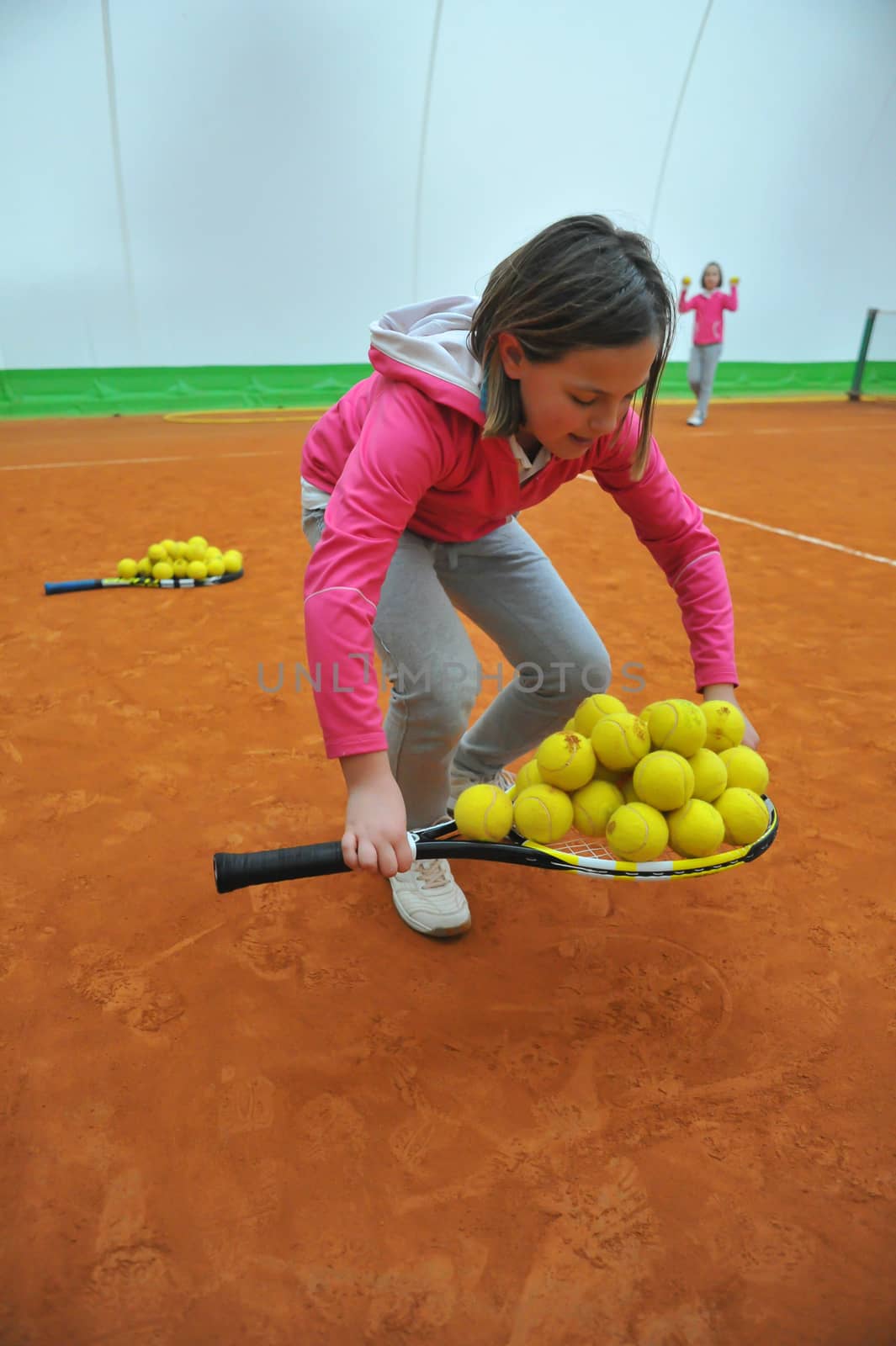 Children at school during a dribble of tennis