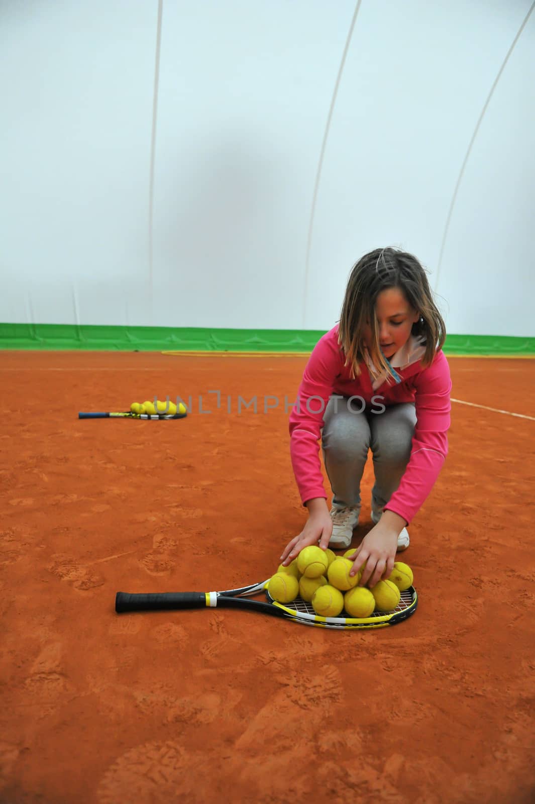 Children at school during a dribble of tennis