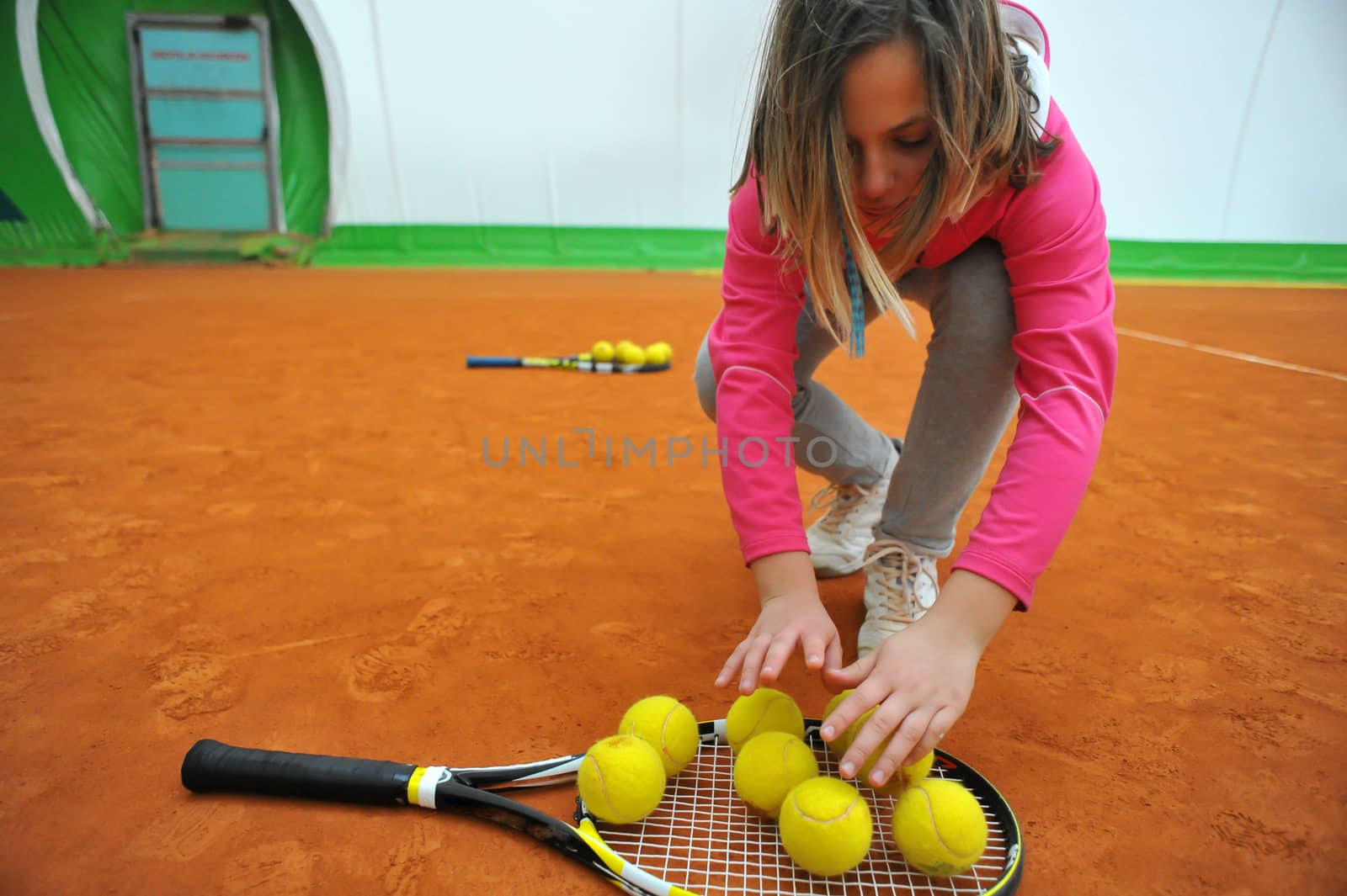 Children at school during a dribble of tennis