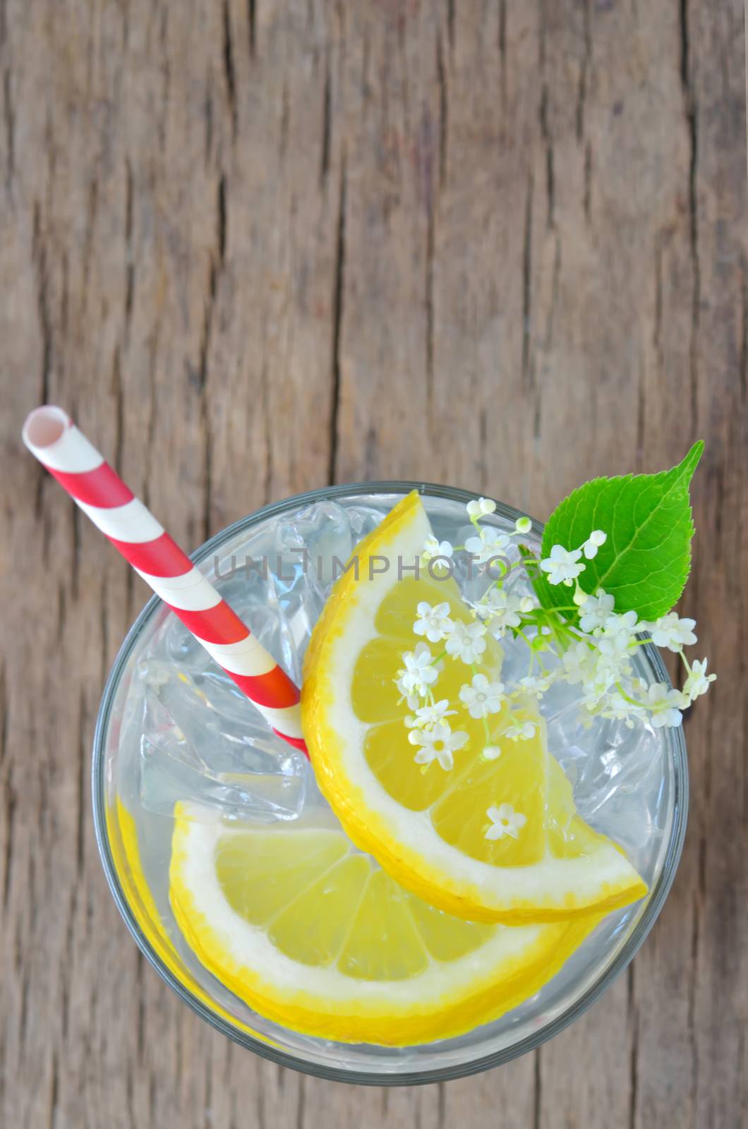 elderflower juice with lemon on old table