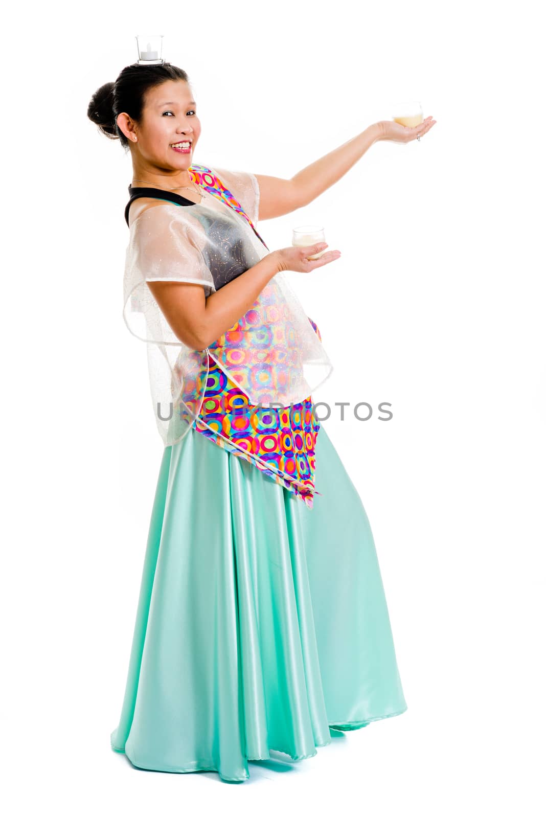 Filipina dressed up in traditional dress.