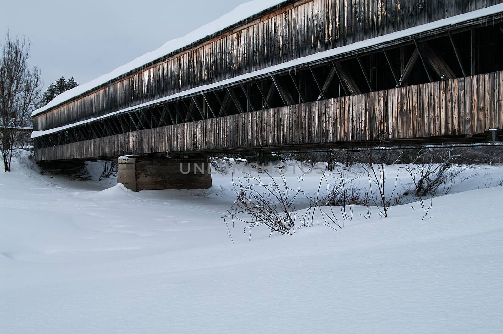 Covered Bridge in the winter by edcorey