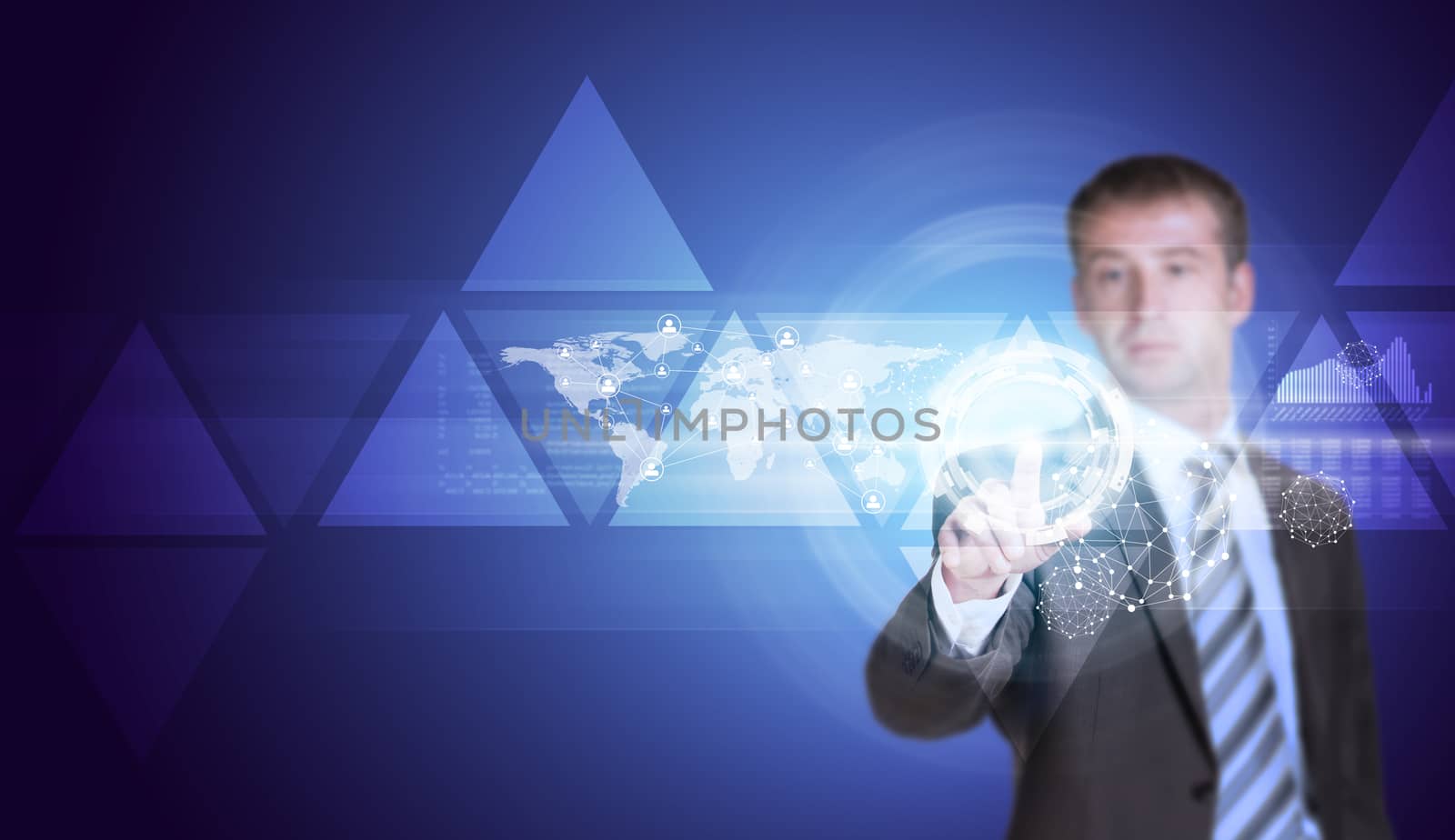 Businessman in suit finger presses virtual button. Triangles, world map and glow circles as backdrop