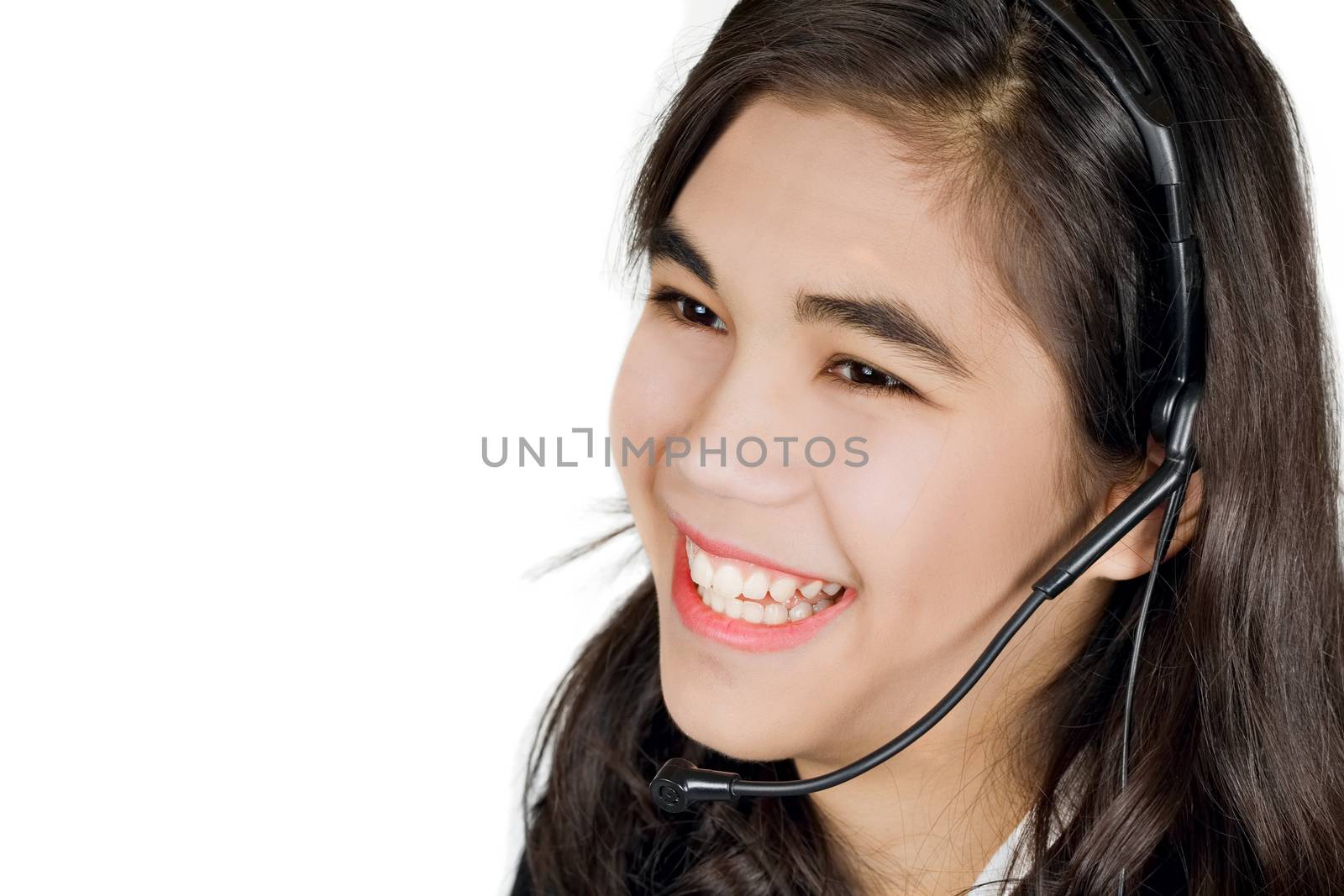 Young woman or teen with headset by jarenwicklund