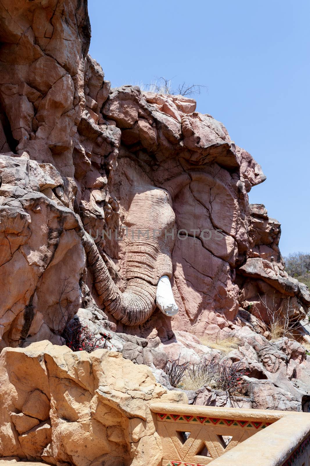 African elephant head relief, artificial rocks in Sun City, South Africa with steam