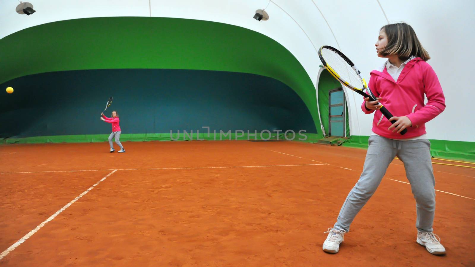 Children at school during a dribble of tennis