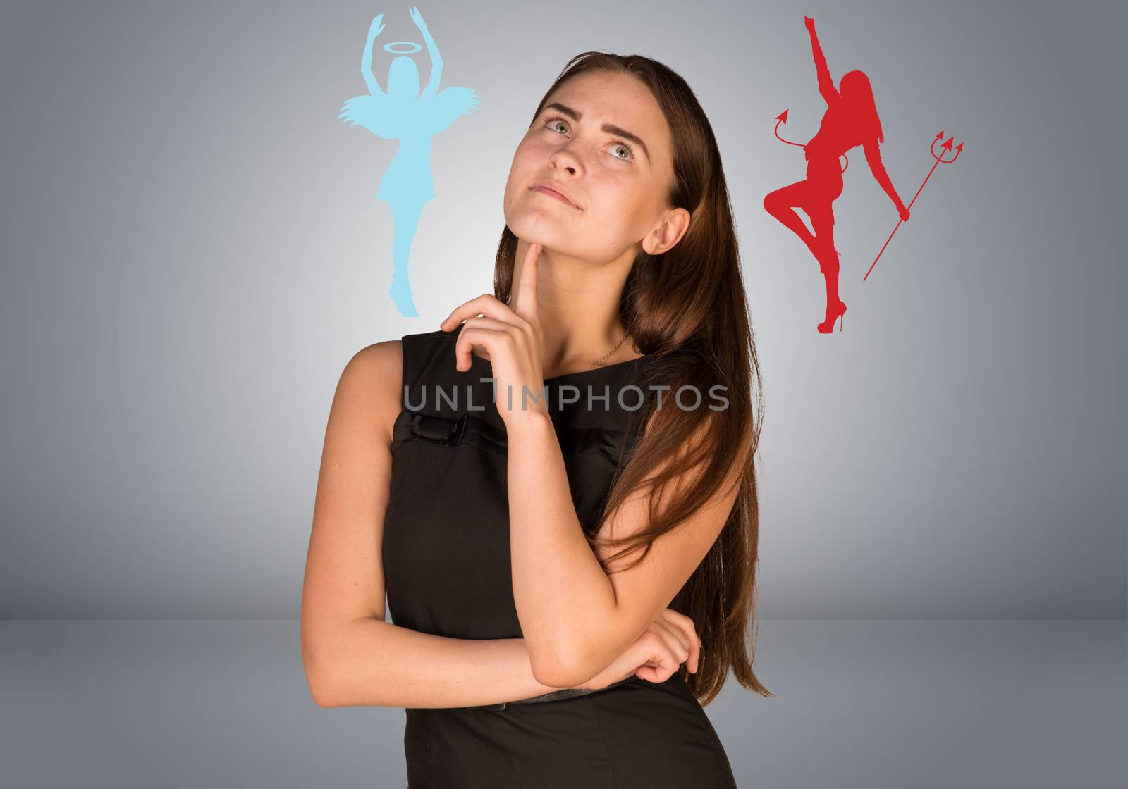 Woman musing between angelic and devilish figures. On gray background