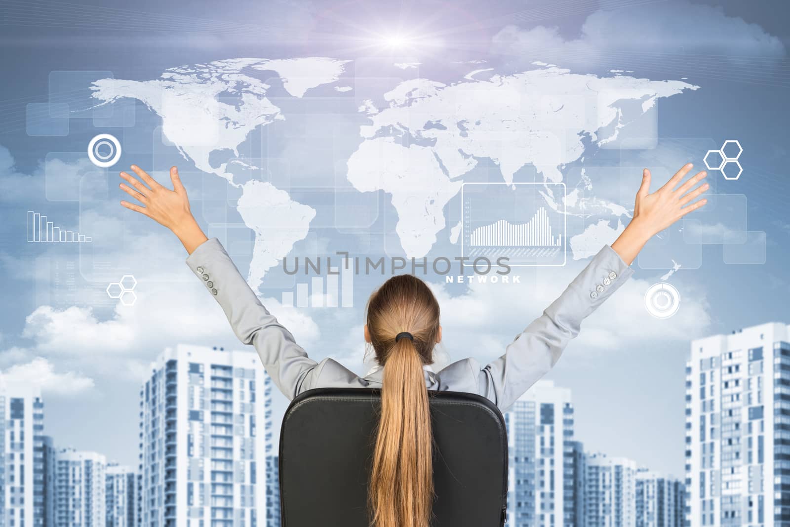 Businesswoman sitting with her hands outstretched against urban background by cherezoff