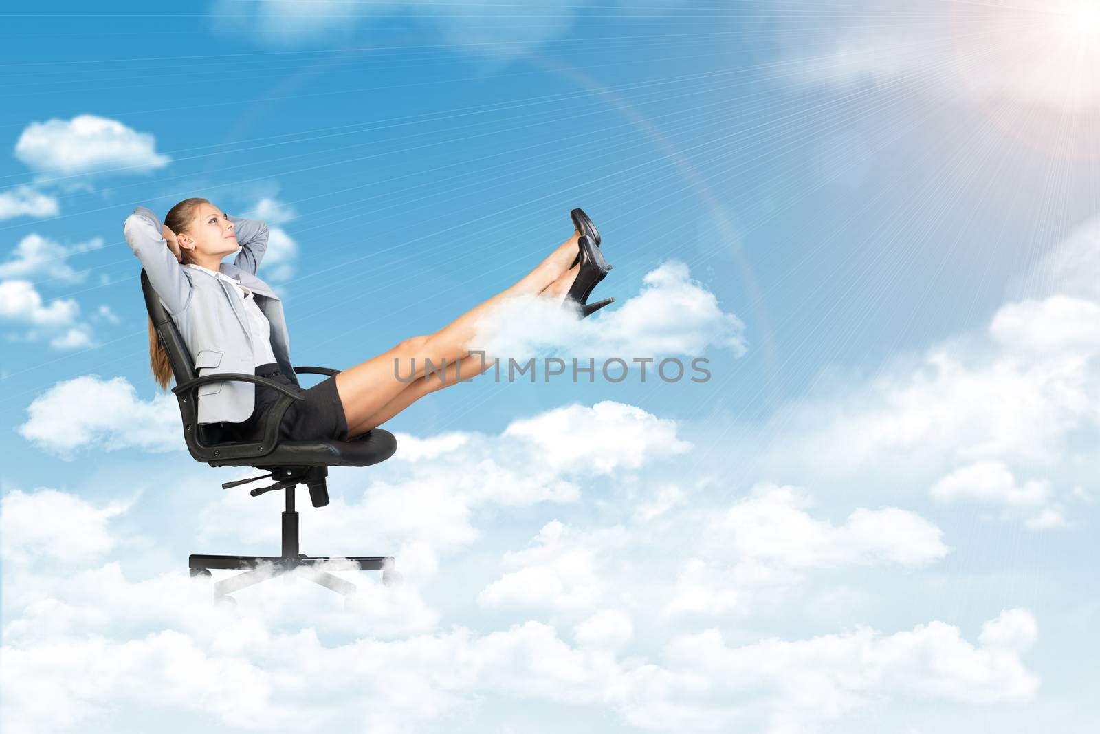 Businesswoman dreaming in clouds by cherezoff