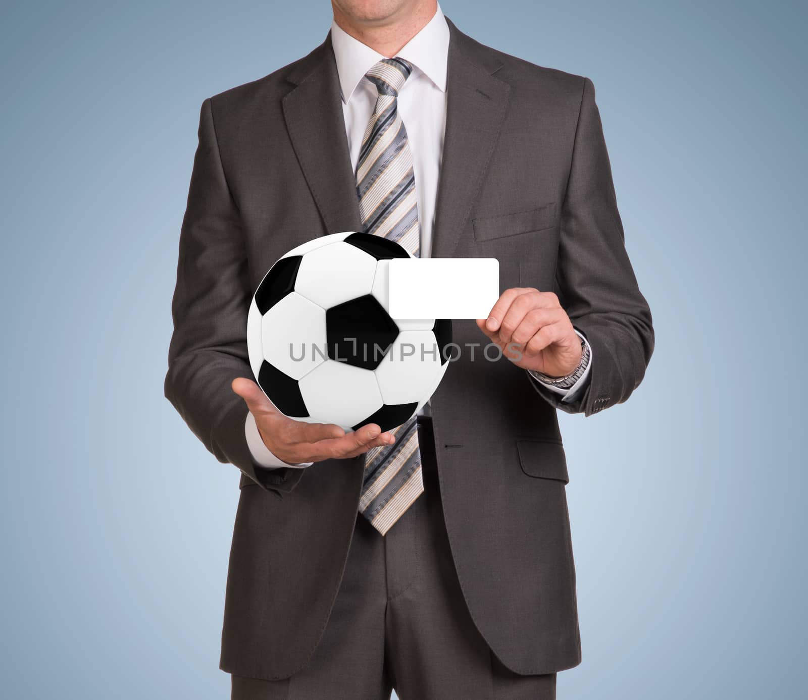 Businessman in suit hold empty card and soccer ball. Blue background