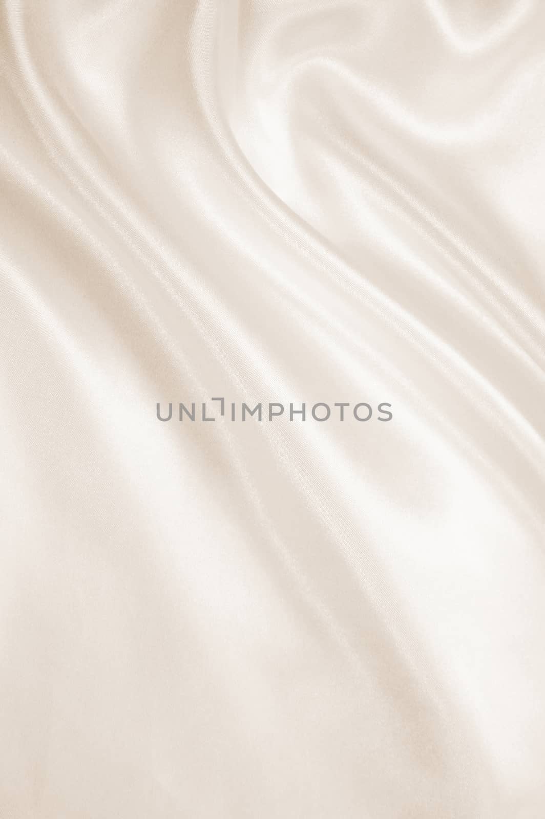 Smooth elegant golden silk as wedding background. In Sepia toned by oxanatravel