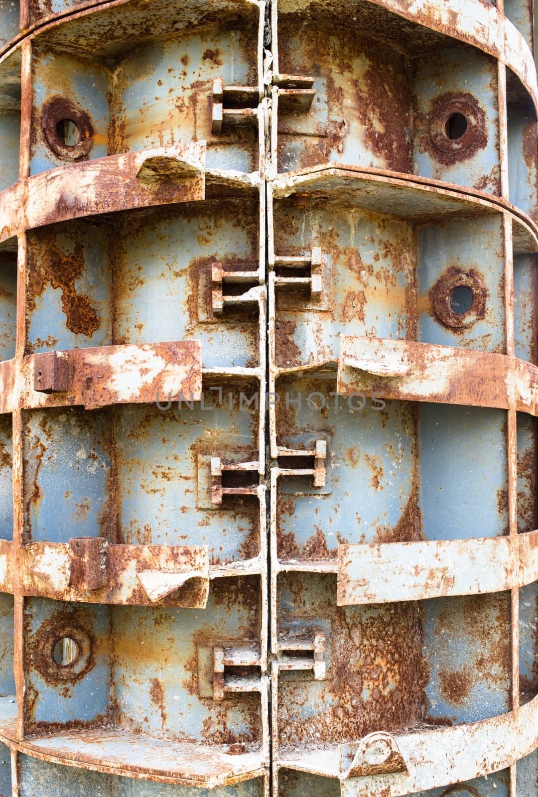 Rusty metal formwork used for building the concrete constructions.