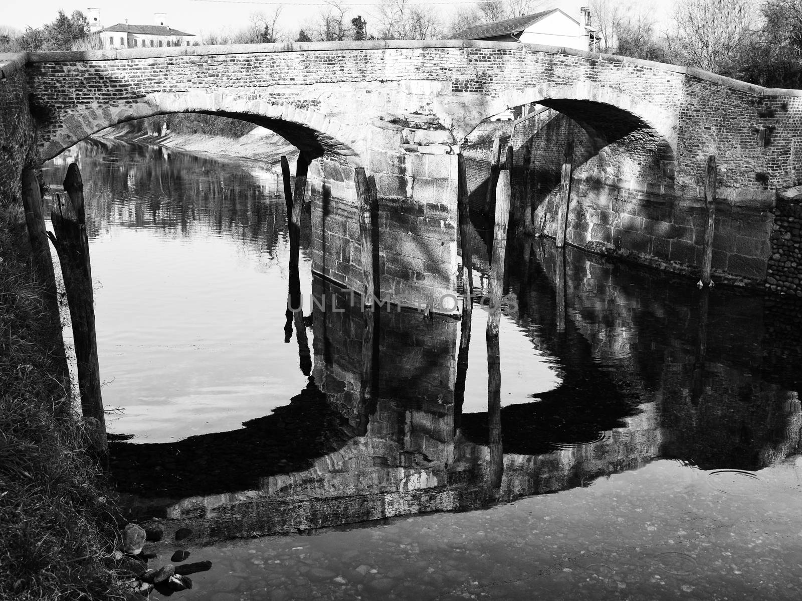 Bridge reflection on water by ClaudioArnese