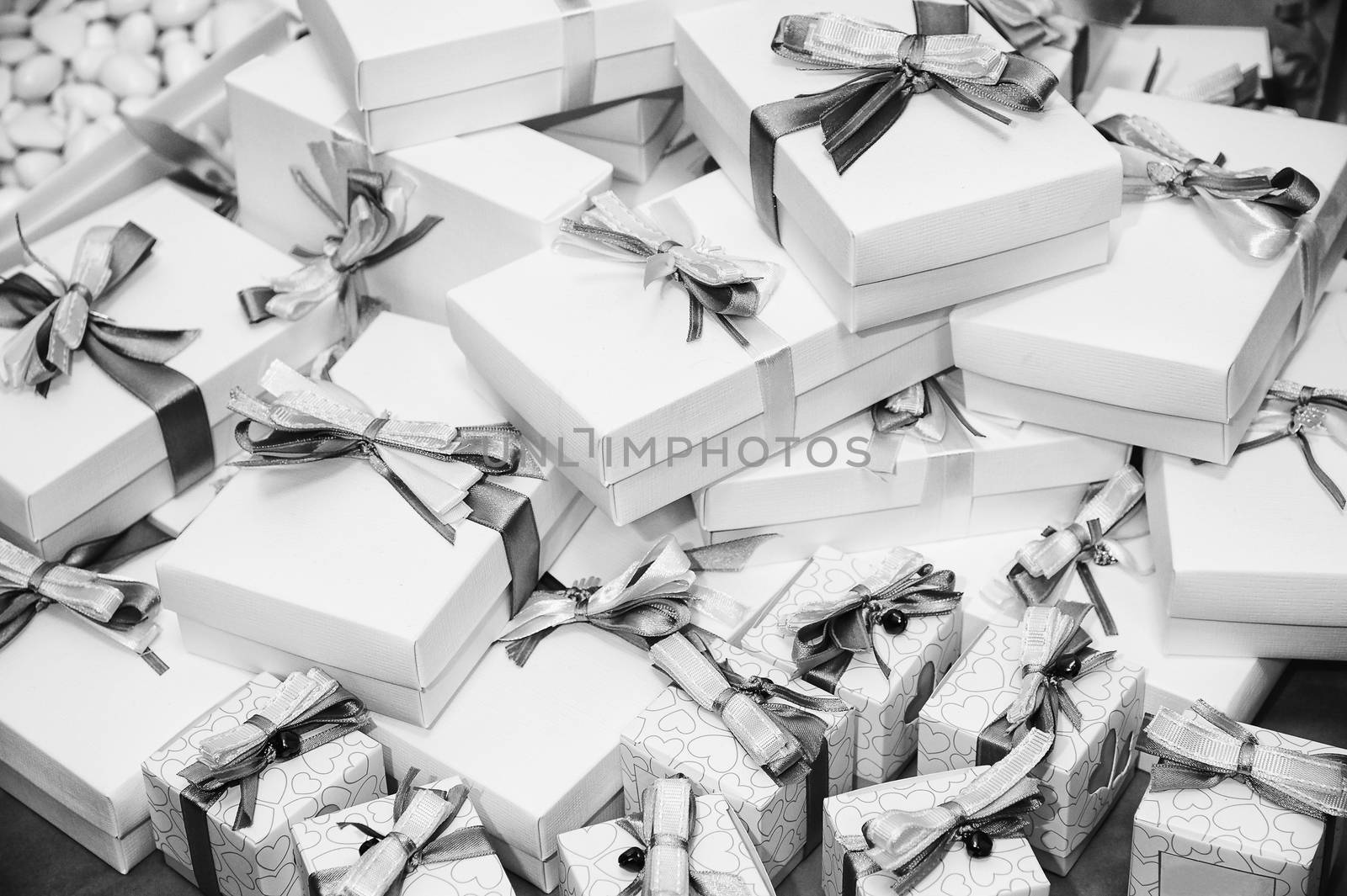 Gifts pile with ribbons by ClaudioArnese