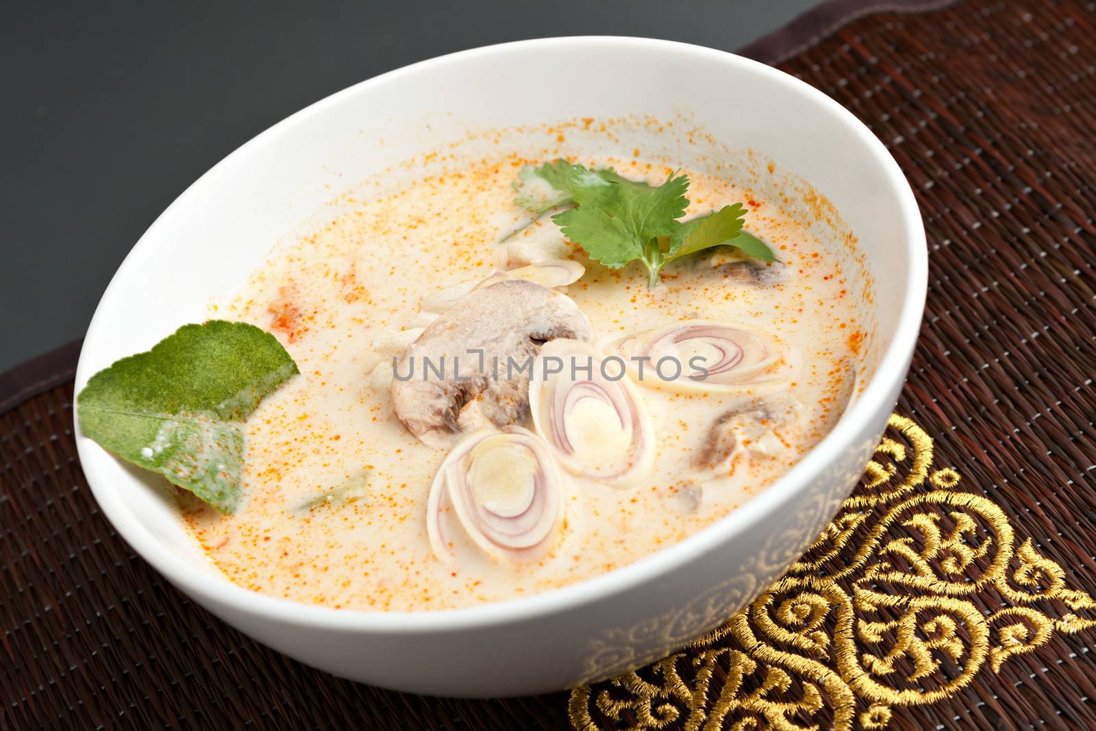 Creamy thai soup with coconut curry mushrooms and vegetables.