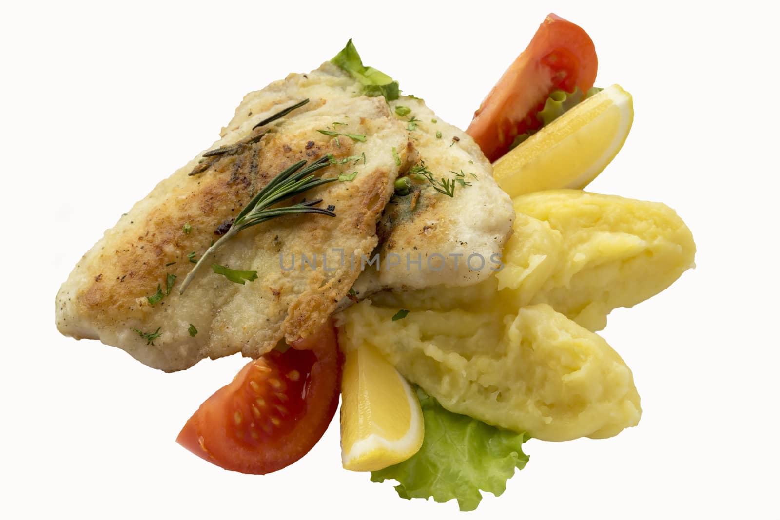 Tilapia fillet with lemon ,tomatoes and potatoes.